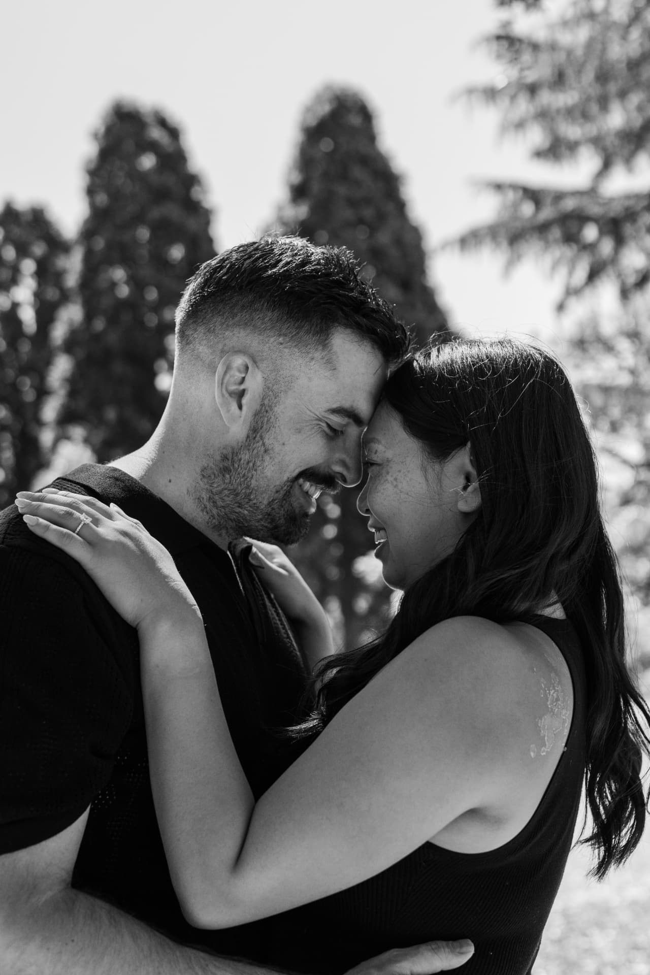 Jake and Rachel sharing an intimate moment in black and white